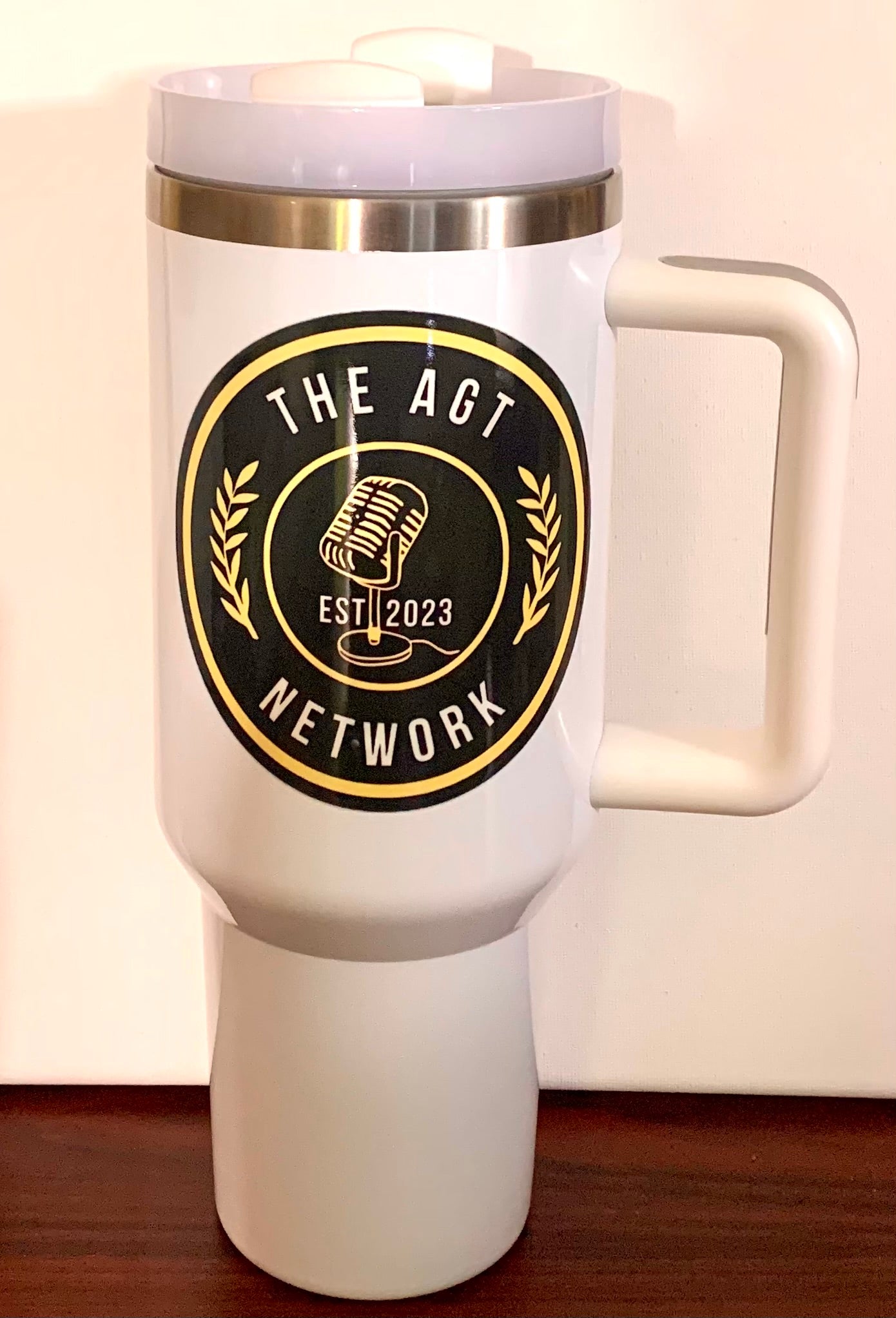 The AGT Network Double Sided Logo 40oz White Stainless Steel Tumbler With Lid